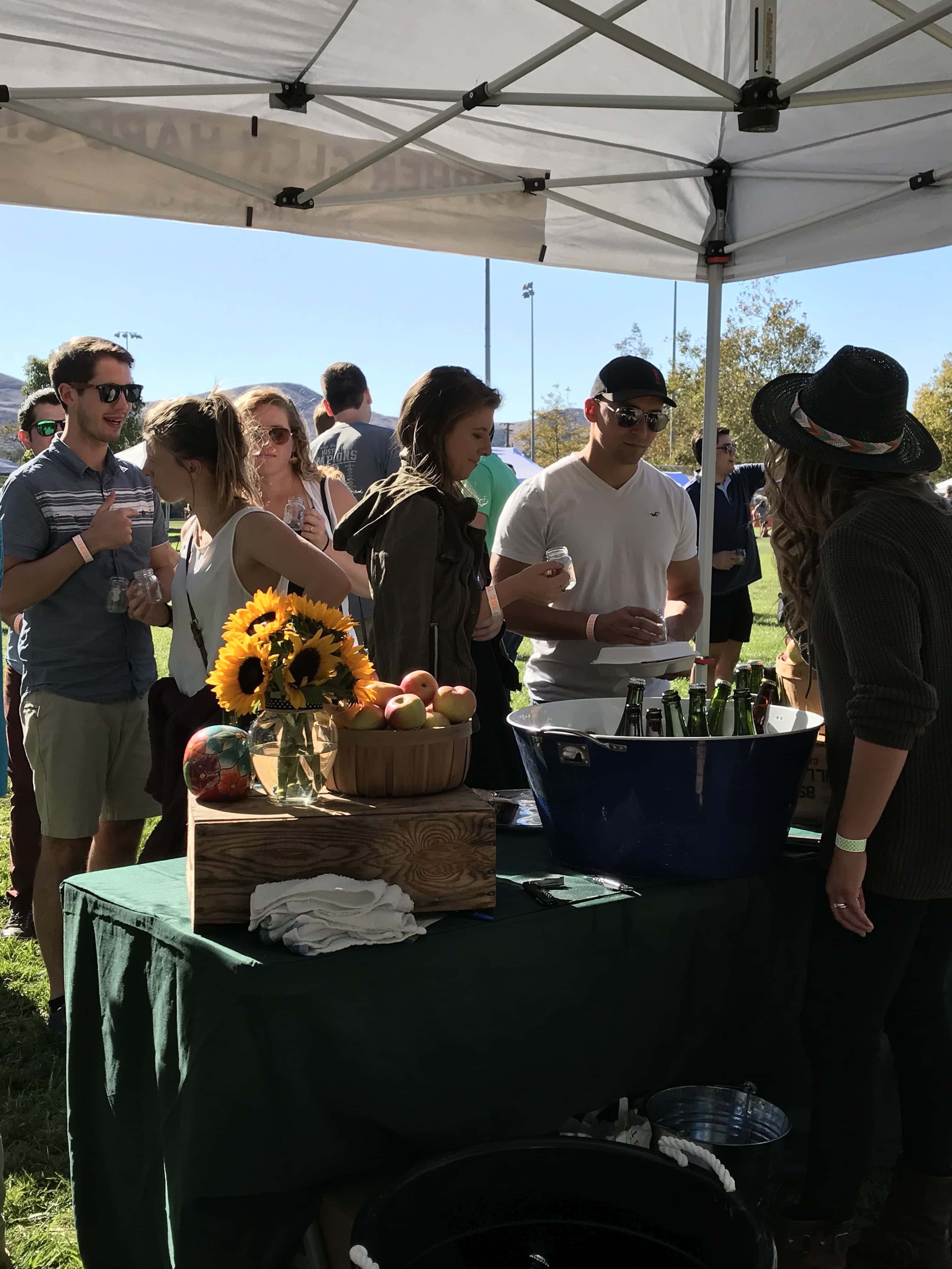 vendor pouring cider photo