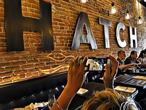 Picture of a picture. the Hatch sign and logo