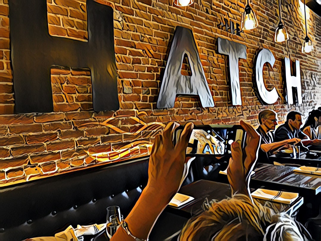 Picture of a picture. the Hatch sign and logo